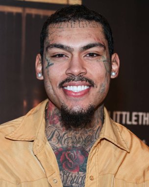 InkMonstarr, 8 Kasım 2023 'te Batı Hollywood EDITION Oteli' ndeki Sunset at EDITION 'da düzenlenen PrettyLittleThing X Lori Harvey Party Wear Collection Launch' a ulaşır..