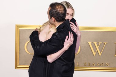 Elizabeth Debicki and Khalid Abdalla arrive at the Los Angeles Premiere Of Netflix's 'The Crown' Season 6 Part 1 held at the Regency Village Theatre on November 12, 2023 in Westwood, Los Angeles, California, United States.