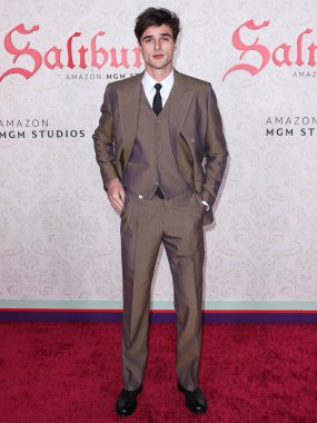 Australian actor Jacob Elordi wearing Givenchy arrives at the Los Angeles Premiere Of Amazon MGM Studios' 'Saltburn' held at The Theatre at Ace Hotel on November 14, 2023 in Los Angeles, California, United States. clipart