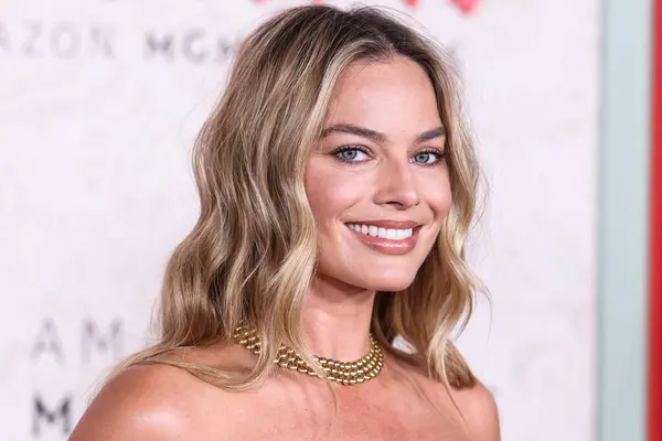 stock image Australian actress and film producer Margot Robbie wearing a Schiaparelli dress arrives at the Los Angeles Premiere Of Amazon MGM Studios' 'Saltburn' held at The Theatre at Ace Hotel on November 14, 2023 in Los Angeles, California, United States. 