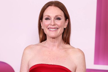 American actress Julianne Moore wearing a Prada dress arrives at the Los Angeles Premiere Of Netflix's 'May December' held at the Academy Museum of Motion Pictures on November 16, 2023 in Los Angeles, California, United States.  clipart