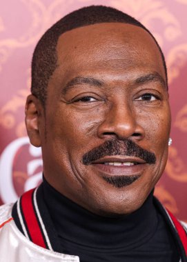 American actor and comedian Eddie Murphy arrives at the World Premiere Of Amazon Prime Video's 'Candy Cane Lane' held at the Regency Village Theatre on November 28, 2023 in Westwood, Los Angeles, California, United States.  clipart