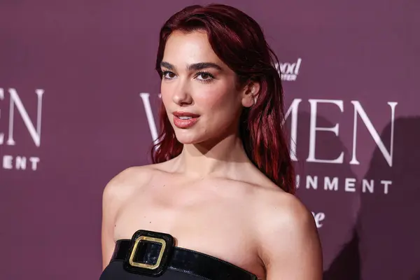 stock image English-Albanian singer and songwriter Dua Lipa arrives at The Hollywood Reporter's Women In Entertainment Gala 2023 presented by Lifetime held at The Beverly Hills Hotel on December 7, 2023 in Beverly Hills, Los Angeles, California, United States. 