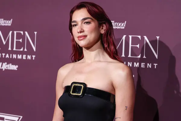 stock image English-Albanian singer and songwriter Dua Lipa arrives at The Hollywood Reporter's Women In Entertainment Gala 2023 presented by Lifetime held at The Beverly Hills Hotel on December 7, 2023 in Beverly Hills, Los Angeles, California, United States. 