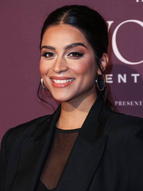 Kanadalı YouTuber, TV sunucusu, komedyen, oyuncu ve yazar Lilly Singh 7 Aralık 2023 'te Beverly Hills Hotel' de düzenlenen The Hollywood Reporter 's Women In Entertainment Gala 2023' e geldi.