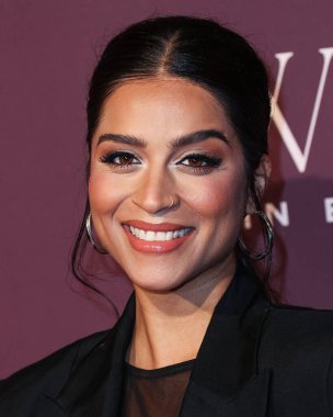 Kanadalı YouTuber, TV sunucusu, komedyen, oyuncu ve yazar Lilly Singh 7 Aralık 2023 'te Beverly Hills Hotel' de düzenlenen The Hollywood Reporter 's Women In Entertainment Gala 2023' e geldi.