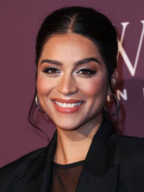 Kanadalı YouTuber, TV sunucusu, komedyen, oyuncu ve yazar Lilly Singh 7 Aralık 2023 'te Beverly Hills Hotel' de düzenlenen The Hollywood Reporter 's Women In Entertainment Gala 2023' e geldi.