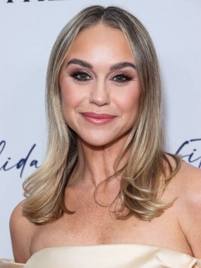 American actress, singer and dancer Becca Tobin arrives at the American Ballet Theatre's Holiday Benefit 2023 held at The Beverly Hilton Hotel on December 11, 2023 in Beverly Hills, Los Angeles, California, United States. clipart