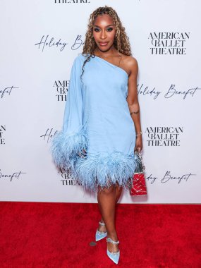 Jackie Aina arrives at the American Ballet Theatre's Holiday Benefit 2023 held at The Beverly Hilton Hotel on December 11, 2023 in Beverly Hills, Los Angeles, California, United States. clipart