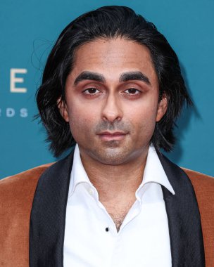 Amerikalı film yapımcısı ve senarist Adi Shankar, 16 Aralık 2023 'te Beverly Hills, Los Angeles, Kaliforniya, ABD' deki The Beverly Hilton Hotel 'de düzenlenen 21.. 