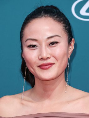 Amerikalı gazeteci Melody Hahm, 16 Aralık 2023 'te Beverly Hilton Hotel' de düzenlenen 21. Geleneksel Unutulmaz Asya Amerikan Ödülleri 'ne geldi..