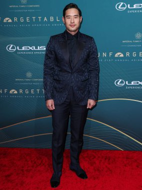 Amerikalı aktör Raymond Lee, 16 Aralık 2023 'te Beverly Hilton Oteli' nde düzenlenen 21. Unutulmaz Asya Amerikan Ödülleri 'ne geliyor..