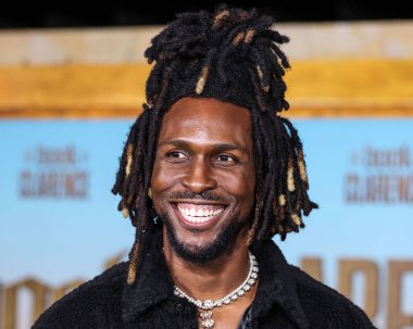 SAINt JHN (Carlos St. John Phillips), 5 Ocak 2024 'te Los Angeles, Kaliforniya, ABD' de bulunan Los Angeles Sinema Müzesi 'ndeki David Geffen Tiyatrosu' nda düzenlenen Sony Pictures 'ın' The Book of Clarence 'filminin Los Angeles galasına geldi.. 