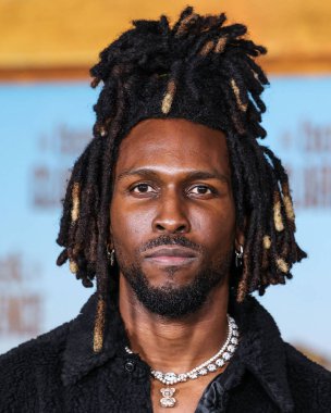 SAINt JHN (Carlos St. John Phillips), 5 Ocak 2024 'te Los Angeles, Kaliforniya, ABD' de bulunan Los Angeles Sinema Müzesi 'ndeki David Geffen Tiyatrosu' nda düzenlenen Sony Pictures 'ın' The Book of Clarence 'filminin Los Angeles galasına geldi.. 