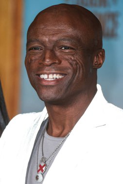 Seal (Seal Henry Olusegun Olumide Adeola Samuel), 5 Ocak 2024 tarihinde Los Angeles, Kaliforniya, ABD 'de bulunan Los Angeles Sinema Müzesi' ndeki David Geffen Tiyatrosu 'nda düzenlenen Sony Pictures' ın 'The Book of Clarence' adlı galasına ulaşır.