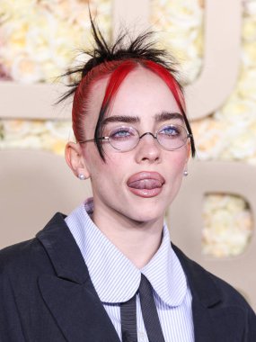 Billie Eilish wearing Willy Chavarria with jewelry by Assael and Anita Ko, plus Oliver Peoples glasses arrives at the 81st Annual Golden Globe Awards held at The Beverly Hilton Hotel on January 7, 2024 in Beverly Hills, Los Angeles, California, USA