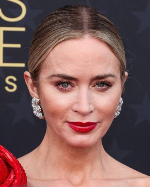 Emily Blunt wearing a Giorgio Armani Prive dress, Alexander Birman shoes, a Tyler Ellis clutch, and Tiffany and Co. jewelry arrives at the 29th Annual Critics' Choice Awards held at The Barker Hangar on January 14, 2024 in Santa Monica, Los Angeles clipart