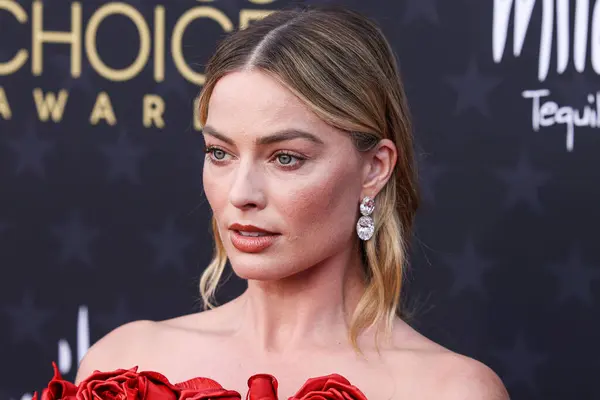 stock image Margot Robbie wearing custom Balmain arrives at the 29th Annual Critics' Choice Awards held at The Barker Hangar on January 14, 2024 in Santa Monica, Los Angeles, California, United States.