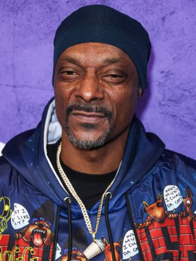 Snoop Dogg arrives at the World Premiere Of Amazon Prime Video's 'The Underdoggs' held at The Culver Theater on January 23, 2024 in Culver City, Los Angeles, California, United States. 