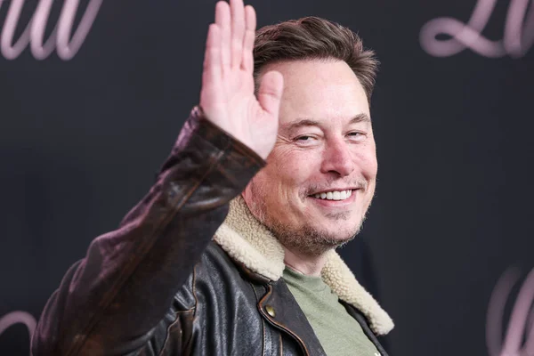 Elon Musk Ankommer Los Angeles Premiere Vertical Entertainment Lola Holdt stockbilde