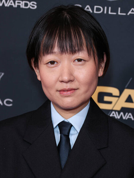 Celine Song wearing Prada arrives at the 76th Annual Directors Guild Of America (DGA) Awards held at The Beverly Hilton Hotel on February 10, 2024 in Beverly Hills, Los Angeles, California, United States