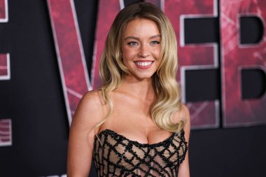Sydney Sweeney, Oscar de la Renta ve Fred Leighton mücevherlerini takarak 12 Şubat 2024 'te Westwood, Los Angeles, Kaliforniya, ABD' deki Regency Village Theatre 'da düzenlenen Columbia Pictures' ın 'Madame Web' adlı filminin dünya prömiyerine ulaştı..