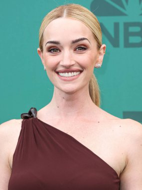 Brianne Howey wearing a Silvia Tcherassi dress arrives at the 49th Annual People's Choice Awards 2024 held at The Barker Hangar on February 18, 2024 in Santa Monica, Los Angeles, California, United States. clipart