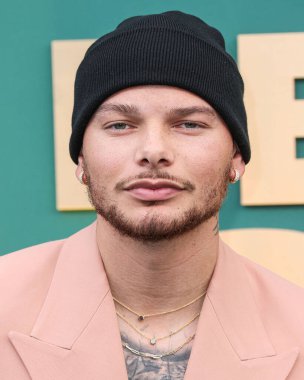 Kane Brown arrives at the 49th Annual People's Choice Awards 2024 held at The Barker Hangar on February 18, 2024 in Santa Monica, Los Angeles, California, United States.