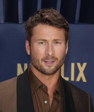 Brioni 'yi giyen Glen Powell, 24 Şubat 2024' te ABD 'nin Kaliforniya eyaletinin Los Angeles kentinde düzenlenen Shrine Konser Salonu ve Fuar Salonu' nda düzenlenen 30..