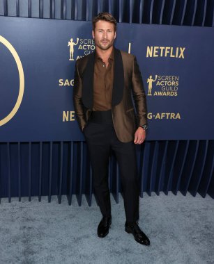 Brioni 'yi giyen Glen Powell, 24 Şubat 2024' te ABD 'nin Kaliforniya eyaletinin Los Angeles kentinde düzenlenen Shrine Konser Salonu ve Fuar Salonu' nda düzenlenen 30..