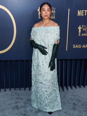 The Row 'u giyen Greta Lee, 24 Şubat 2024' te ABD 'nin Kaliforniya eyaletinin Los Angeles kentinde düzenlenen Shrine Konser Salonu ve Fuar Salonu' nda düzenlenen 30.. 