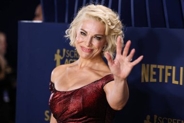 Tony Ward 'u giyen Hannah Waddingham, 24 Şubat 2024' te ABD 'nin Kaliforniya eyaletinin Los Angeles kentinde düzenlenen Shrine Konser Salonu ve Fuar Salonu' nda düzenlenen 30.. 