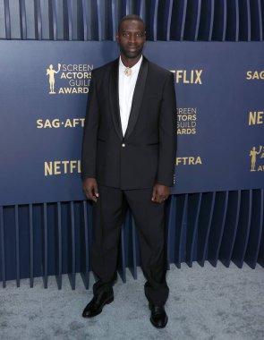 Omar Sy, Shrine Konser Salonu ve Fuar Salonu 'nda düzenlenen 30. Yıllık Sinema Oyuncuları Birliği Ödülleri' ne 24 Şubat 2024 'te Los Angeles, Kaliforniya, ABD' de ulaştı..