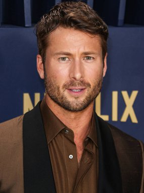 Brioni 'yi giyen Glen Powell, 24 Şubat 2024' te ABD 'nin Kaliforniya eyaletinin Los Angeles kentinde düzenlenen Shrine Konser Salonu ve Fuar Salonu' nda düzenlenen 30..