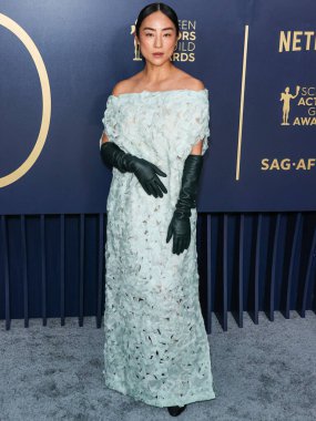 The Row 'u giyen Greta Lee, 24 Şubat 2024' te ABD 'nin Kaliforniya eyaletinin Los Angeles kentinde düzenlenen Shrine Konser Salonu ve Fuar Salonu' nda düzenlenen 30..