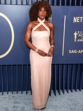 Suzanne Kalan 'ı giyen Issa Rae, 24 Şubat 2024' te ABD 'nin Kaliforniya eyaletinin Los Angeles kentinde düzenlenen Shrine Konser Salonu ve Fuar Salonu' nda düzenlenen 30.. 