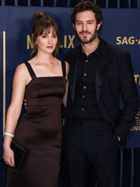 Leighton Meester ve kocası Adam Brody, 24 Şubat 2024 'te ABD' nin Kaliforniya eyaletinin Los Angeles kentindeki Shrine Auditorium ve Expo Hall 'da düzenlenen 30.. 