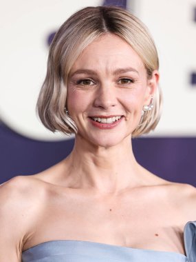 Carey Mulligan wearing a Valentino dress and Bulgari jewelry arrives at the Los Angeles Special Screening Of Netflix's 'Spaceman' held at The Egyptian Theatre Hollywood on February 26, 2024 in Hollywood, Los Angeles, California, United States.  clipart