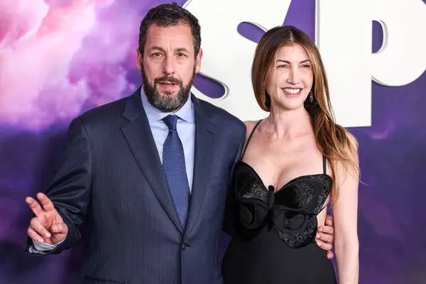 stock image Adam Sandler and wife Jackie Sandler arrive at the Los Angeles Special Screening Of Netflix's 'Spaceman' held at The Egyptian Theatre Hollywood on February 26, 2024 in Hollywood, Los Angeles, California, United States. 