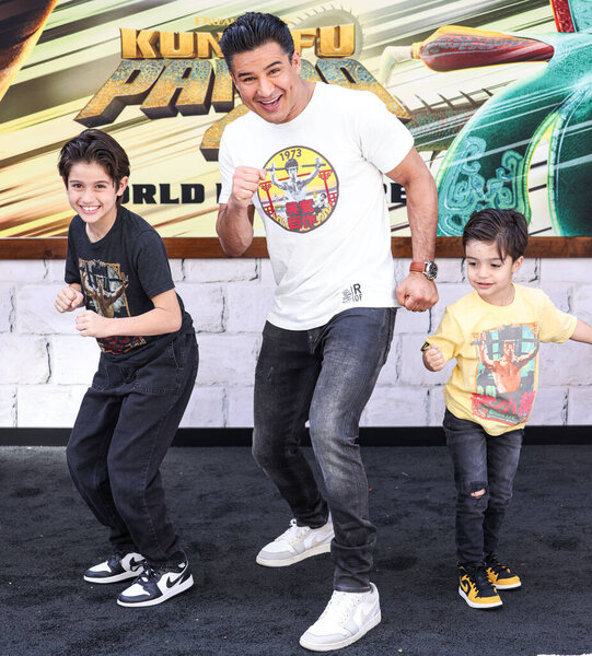 Dominic Lopez, Mario Lopez and Santino Lopez arrive at the World Premiere Of DreamWorks Animation And Universal Pictures' 'Kung Fu Panda 4' held at AMC The Grove 14 on March 3, 2024 in Los Angeles, California, United States. 