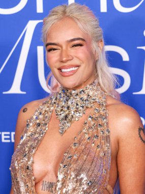 Karol G, 6 Mart 2024 tarihinde Inglewood, Los Angeles, Kaliforniya, ABD 'deki SoFi Stadyumu' ndaki YouTube Tiyatrosu 'nda düzenlenen 2024 Billboard Women in Music' e ulaştı..
