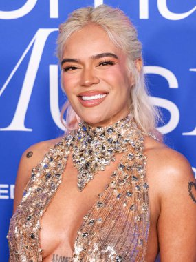 Karol G arrives at the 2024 Billboard Women In Music held at the YouTube Theater at SoFi Stadium on March 6, 2024 in Inglewood, Los Angeles, California, United States.