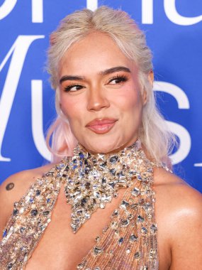 Karol G arrives at the 2024 Billboard Women In Music held at the YouTube Theater at SoFi Stadium on March 6, 2024 in Inglewood, Los Angeles, California, United States.