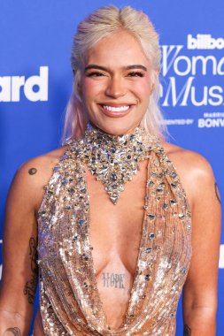 Karol G, 6 Mart 2024 tarihinde Inglewood, Los Angeles, Kaliforniya, ABD 'deki SoFi Stadyumu' ndaki YouTube Tiyatrosu 'nda düzenlenen 2024 Billboard Women in Music' e ulaştı..