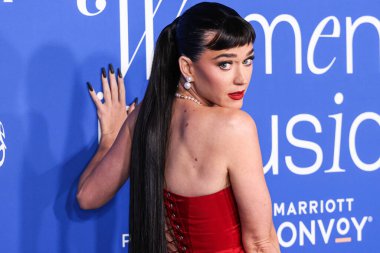 Katy Perry arrives at the 2024 Billboard Women In Music held at the YouTube Theater at SoFi Stadium on March 6, 2024 in Inglewood, Los Angeles, California, United States. clipart