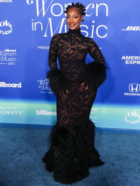 Tems arrives at the 2024 Billboard Women In Music held at the YouTube Theater at SoFi Stadium on March 6, 2024 in Inglewood, Los Angeles, California, United States.