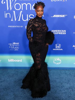 Tems arrives at the 2024 Billboard Women In Music held at the YouTube Theater at SoFi Stadium on March 6, 2024 in Inglewood, Los Angeles, California, United States.
