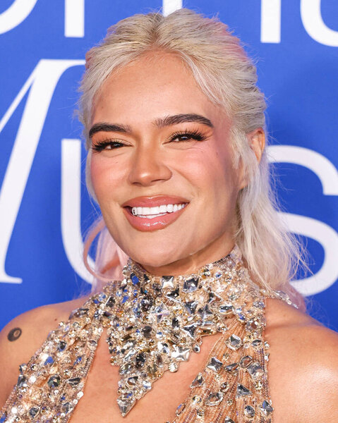 Karol G arrives at the 2024 Billboard Women In Music held at the YouTube Theater at SoFi Stadium on March 6, 2024 in Inglewood, Los Angeles, California, United States.