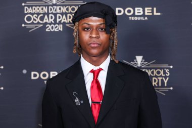 Myles O 'Neal 8 Mart 2024 tarihinde Bel Air, Los Angeles, Kaliforniya, ABD' de düzenlenen Darren Dzienciol 'un Oscar Partisi 2024' e ulaşır.. 