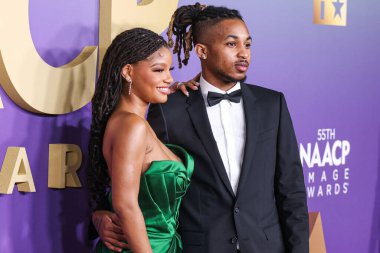 Halle Bailey ve erkek arkadaşı DDDG (Darryl Dwayne Granberry Jr.), 16 Mart 2024 'te ABD' nin Kaliforniya eyaletinin Los Angeles kentinde bulunan Shrine Auditorium ve Expo Hall 'da düzenlenen 55..